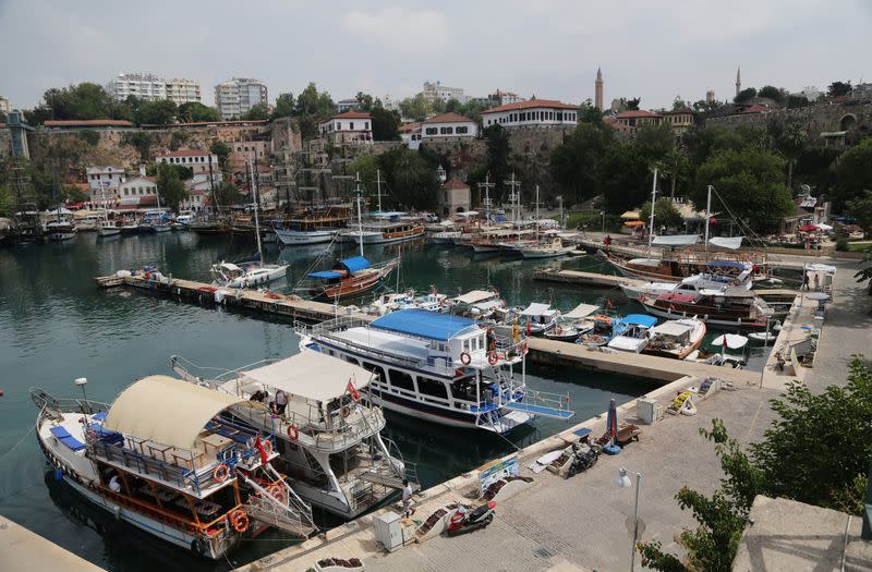 FILE PHOTO: Tourists boats are seen in the harbour of the old city center of the Mediterranean resort city of Antalya