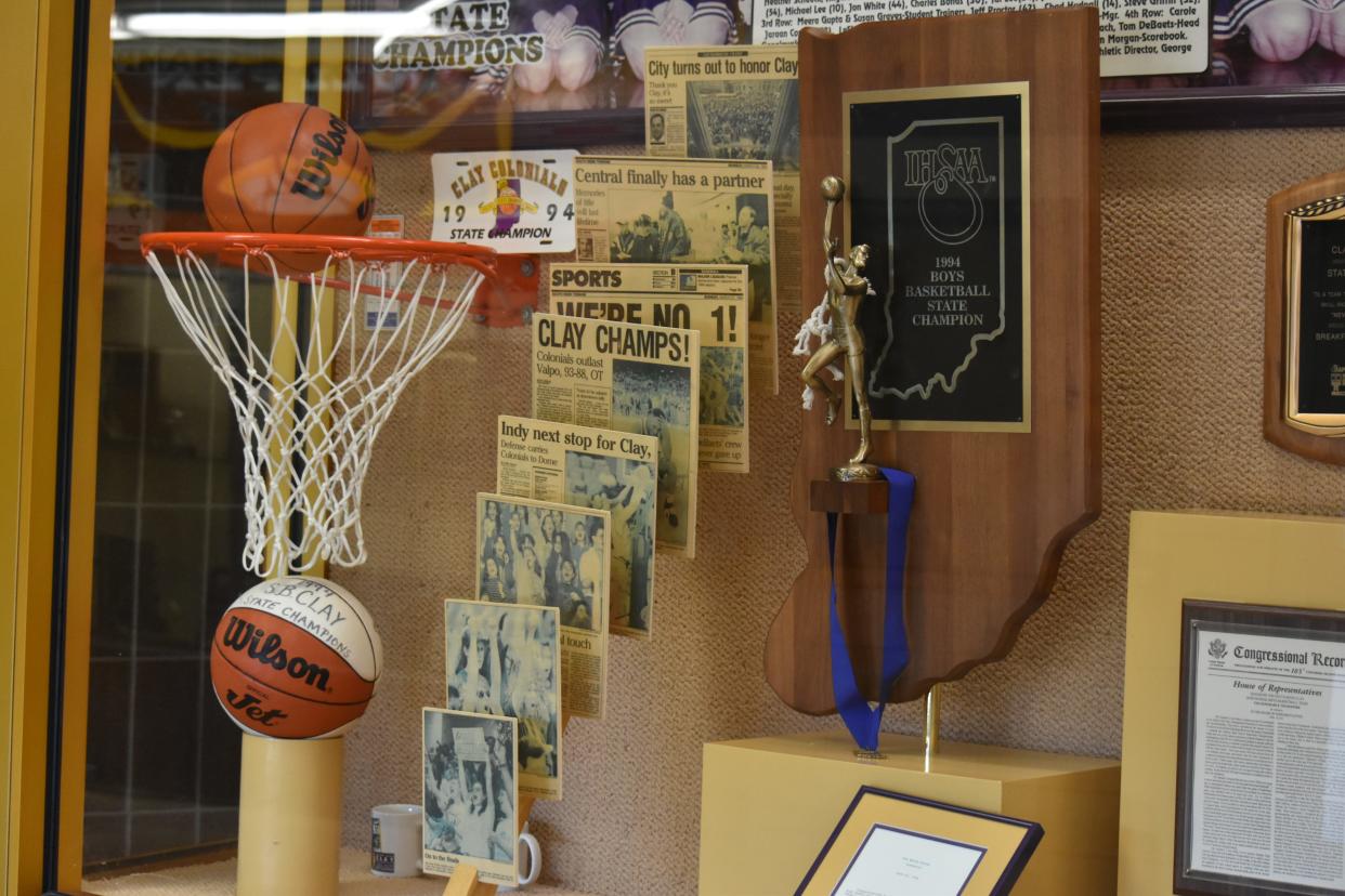Clay High School team trophies, such as the state championship won by the boys basketball team in 1994, will be donated to local museums.
