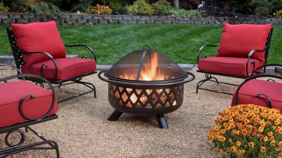 Nothing says cozy like an outdoor fire pit on a spring evening.