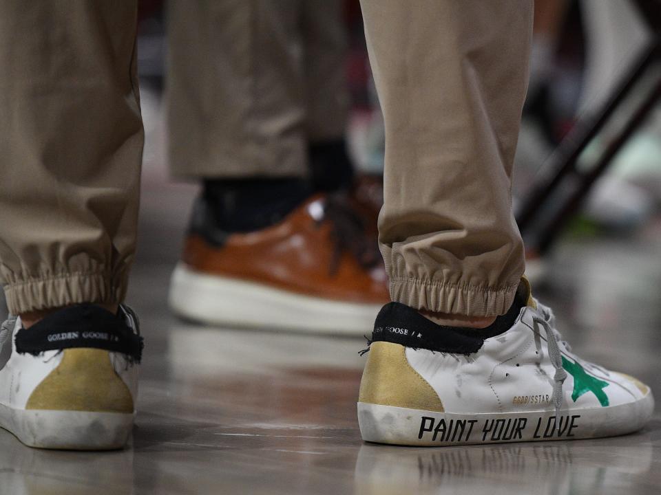 Golden Goose Superstar "Paint Your Love" sneakers.