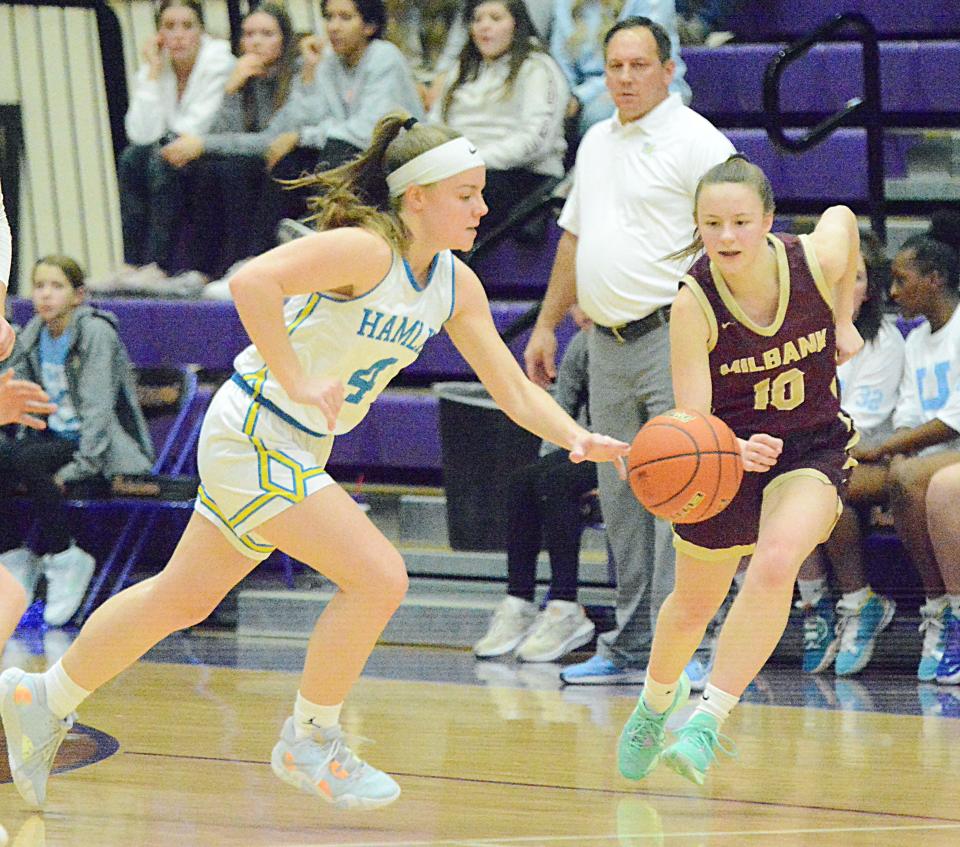 Hamlin's Brooklyn Brandriet picks up a loose ball in front of Milbank's Tyra Berry during their SoDak 16 Class A state-qualifying girls basketball game on Thursday, March 2, 2023 in the Watertown Civic Arena.