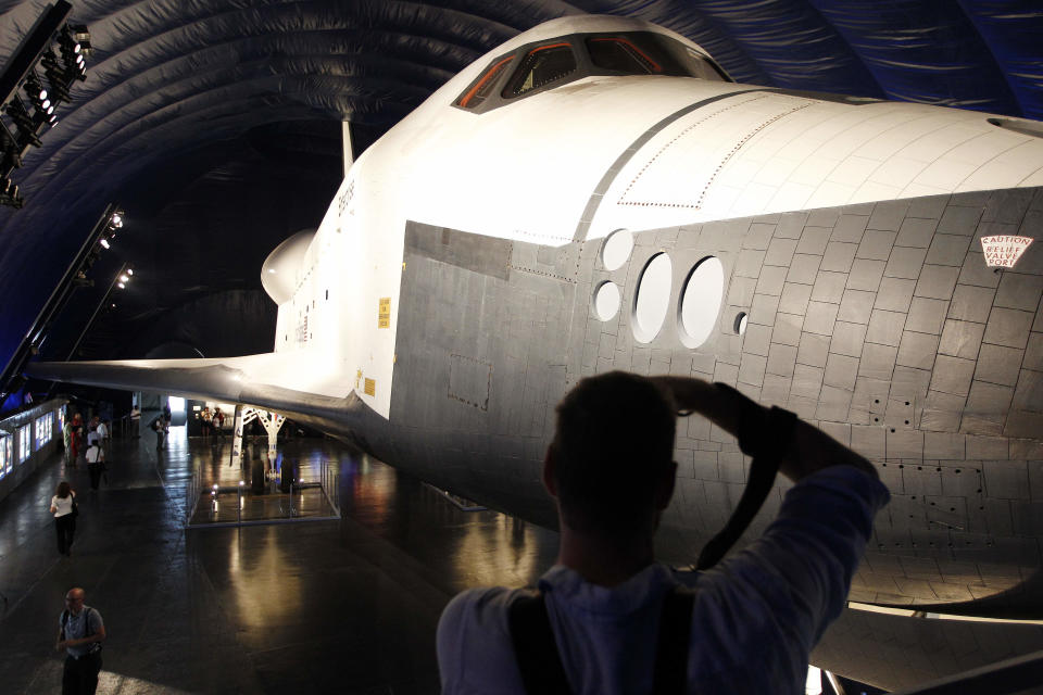 The Space Shuttle Enterprise sits on display at the Sea, Air and Space Museum's Space Shuttle Pavilion Wednesday, July 18, 2012, in New York. The Pavilion will be open to the public Thursday, July 19, 2012. (AP Photo/Frank Franklin II)