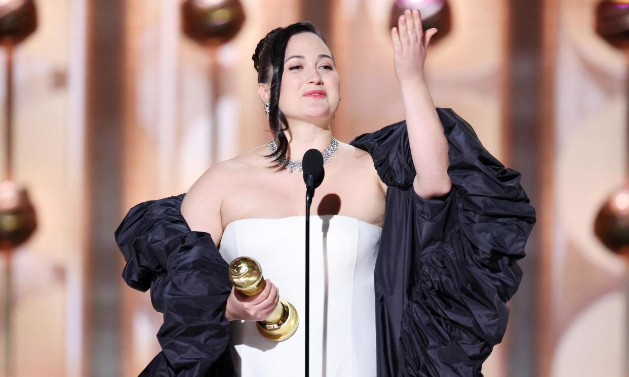 <span>Lily Gladstone accepts her golden Globe for best performance by a female actor in a motion picture.</span><span>Photograph: Rich Polk/Golden Globes 2024/Reuters</span>