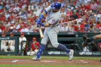 Chicago Cubs' Kyle Schwarber swings for a solo home run during the first inning of a baseball game against the St. Louis Cardinals, Saturday, Sept. 28, 2019, in St. Louis. (AP Photo/Scott Kane)