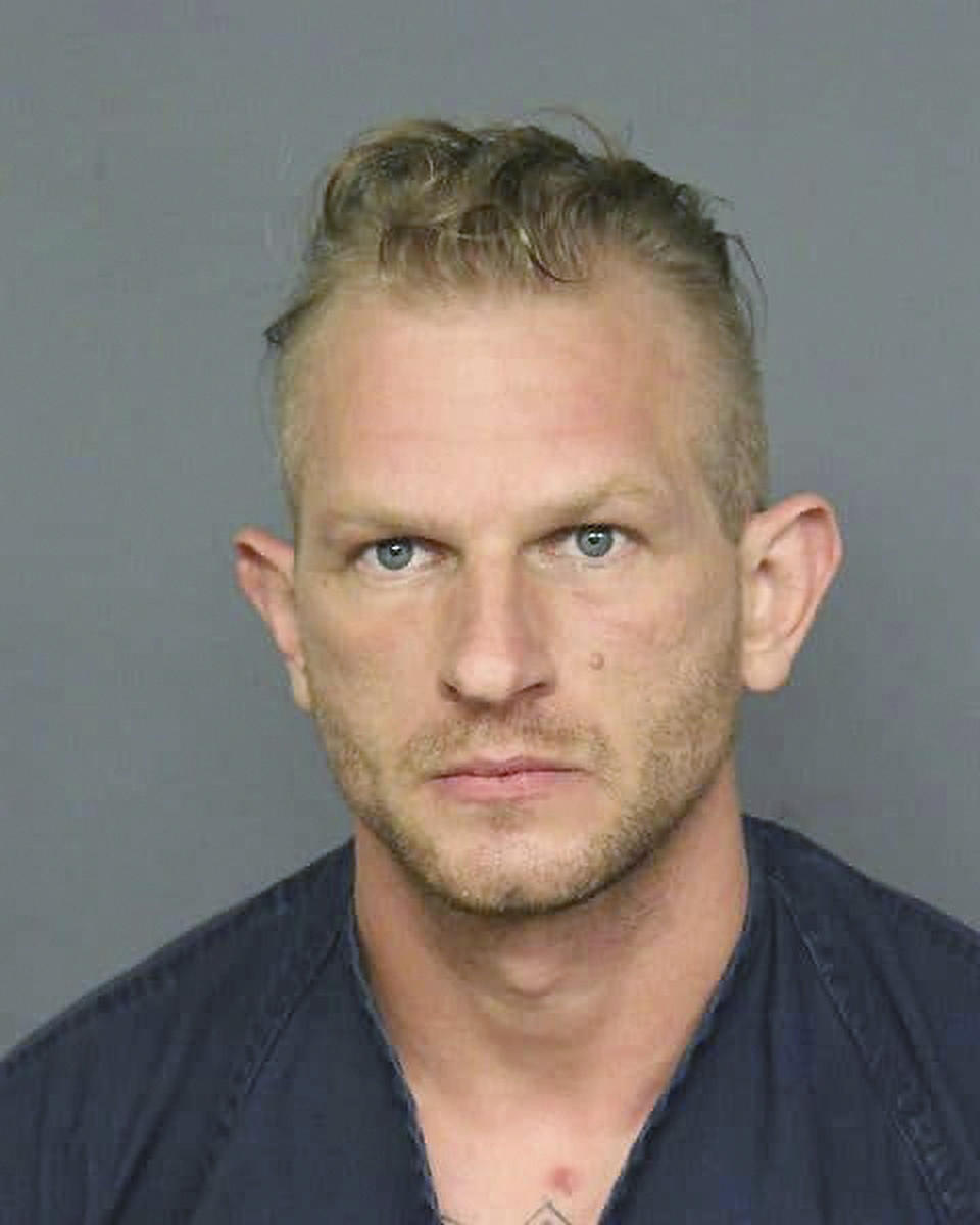 This undated arrest photo released by Denver District Attorney's Office shows Michael R. Close. Close was convicted of using an AK-47 to kill a woman and wound her boyfriend as they walked their dog in Denver and has been sentenced to life in prison. A judge sentenced Close on Friday, Nov. 4, 2022, to a life term without the possibility of parole in the death of 21-year-old Isabella Thallas and added an extra 48-year sentence for the attempted murder of her boyfriend. (Denver District Attorney's Office via AP)