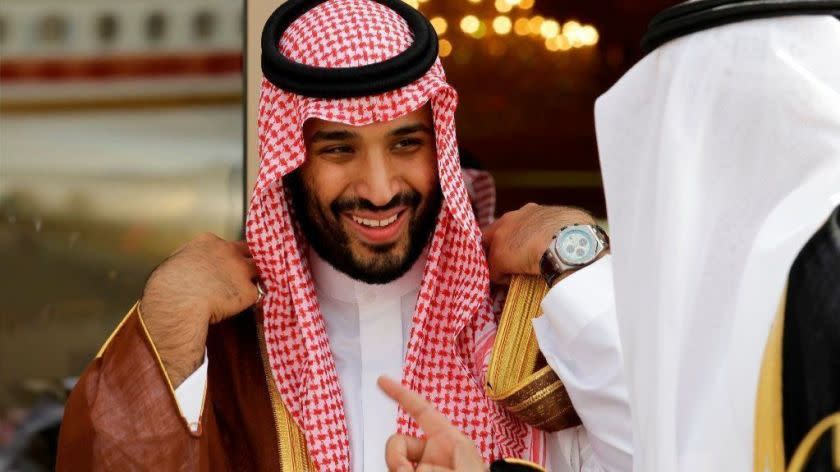 FILE - In this May 14, 2012 file photo, Prince Mohammed bin Salman speaks with a Saudi prince in Riyadh, Saudi Arabia. The disappearance of Saudi journalist and contributor to The Washington Post Jamal Khashoggi on Oct. 2, 2018, in Turkey peels away a carefully cultivated reformist veneer promoted about the Saudi Crown Prince, instead exposing its autocratic tendencies. The kingdom long has been known to grab rambunctious princes or opponents abroad and spirit them back to Riyadh on private planes. But the disappearance of Khashoggi, who Turkish officials fear has been killed, potentially has taken the practice to a new, macabre level by grabbing a writer who could both navigate Saudi Arabia's byzantine royal court and explain it to the West. (AP Photo/Hassan Ammar, File)