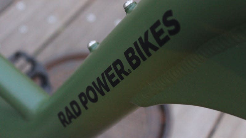 A photo of the Rad Power Bikes logo on the frame of the RadRunner 2. 