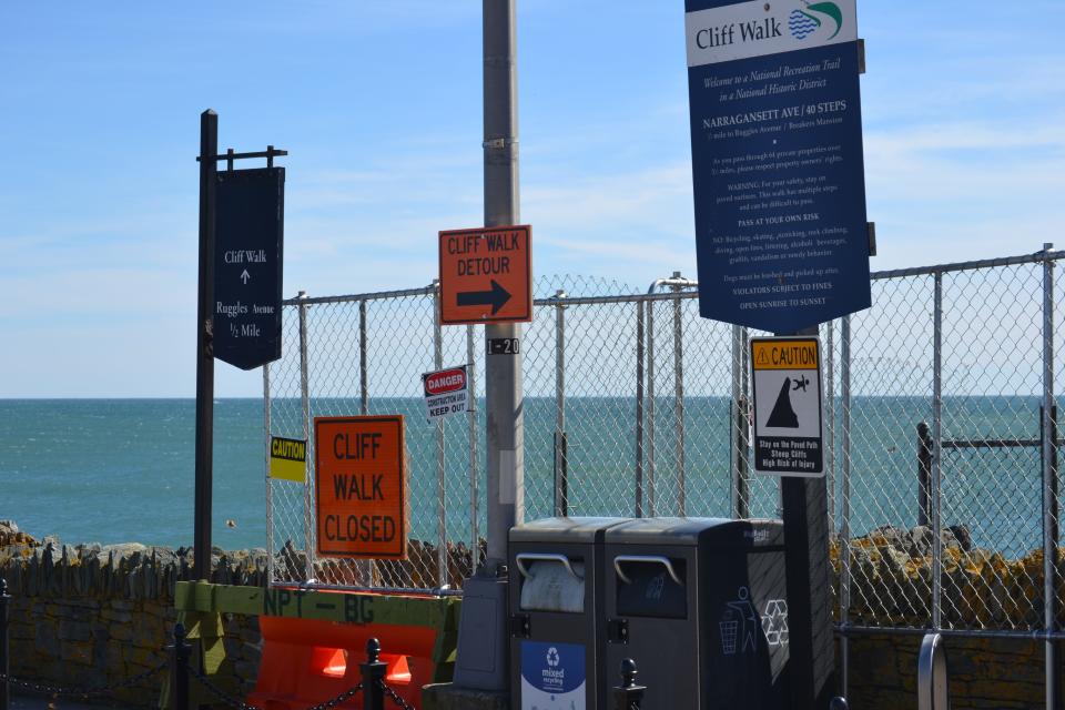 Signs warn walkers of the closure of the Cliff Walk at Narragansett Avenue.