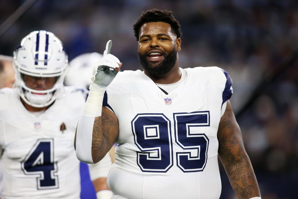 Dec 10, 2023; Arlington, Texas, USA; Dallas Cowboys defensive tackle Johnathan Hankins (95) smiles as he walks off the field before the game against the Philadelphia Eagles at AT&T Stadium. Mandatory Credit: Tim Heitman-USA TODAY Sports