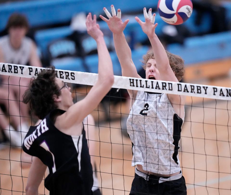 Dublin Jerome's Brady Kilgren (2) attempts to block Pickerington North's Jackson VanWormer during a match last season. Both are among the top players for their teams this spring.