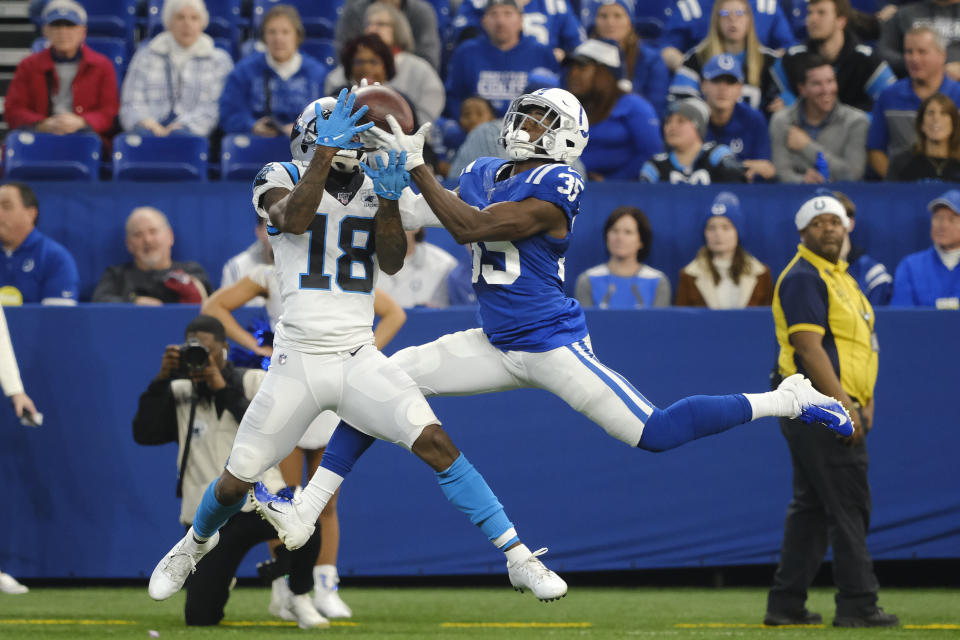 Indianapolis Colts' Pierre Desir makes in interception against Carolina Panthers' DeAndrew White (18) during the second half of an NFL football game, Sunday, Dec. 22, 2019, in Indianapolis. (AP Photo/AJ Mast)