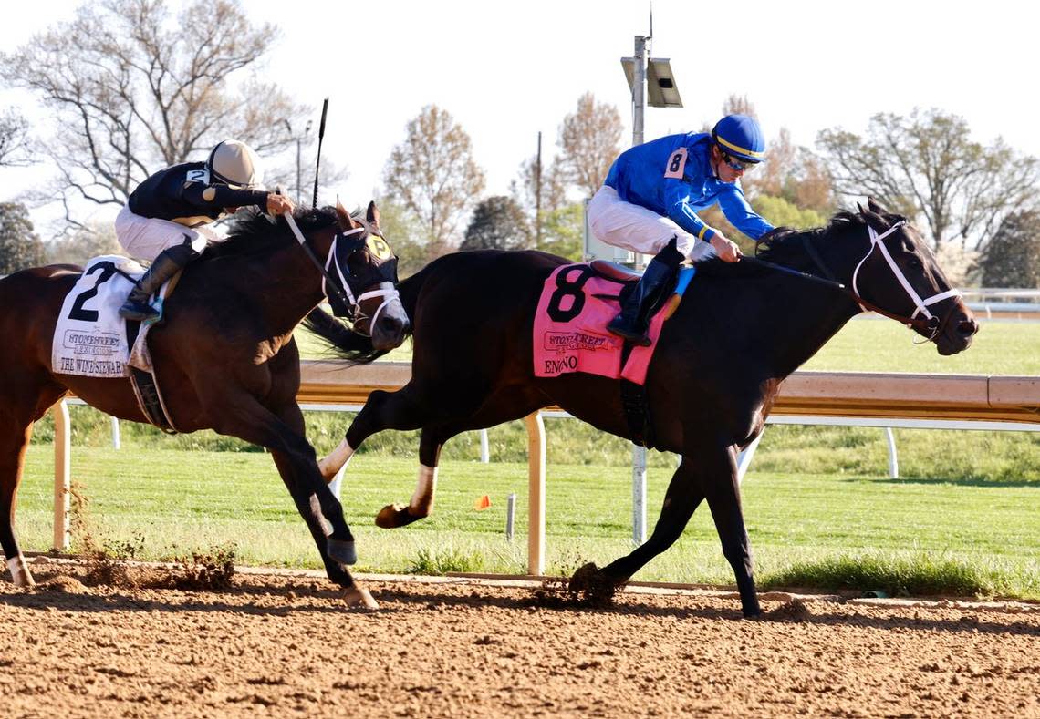 Encino and jockey Florent Geroux hold off The Wine Steward to win the Grade 3 Lexington on April 13 at Keeneland.