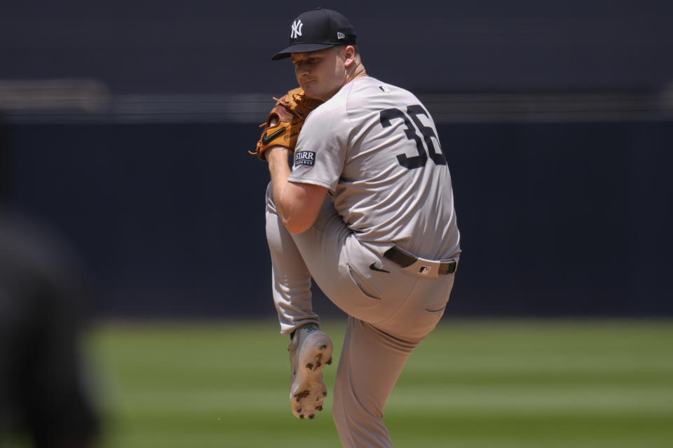 New York Yankees starting pitcher Clarke Schmidt works against a San Diego Padres batter during the first inning of a baseball game, Sunday, May 26, 2024, in San Diego. (AP Photo/Gregory Bull)