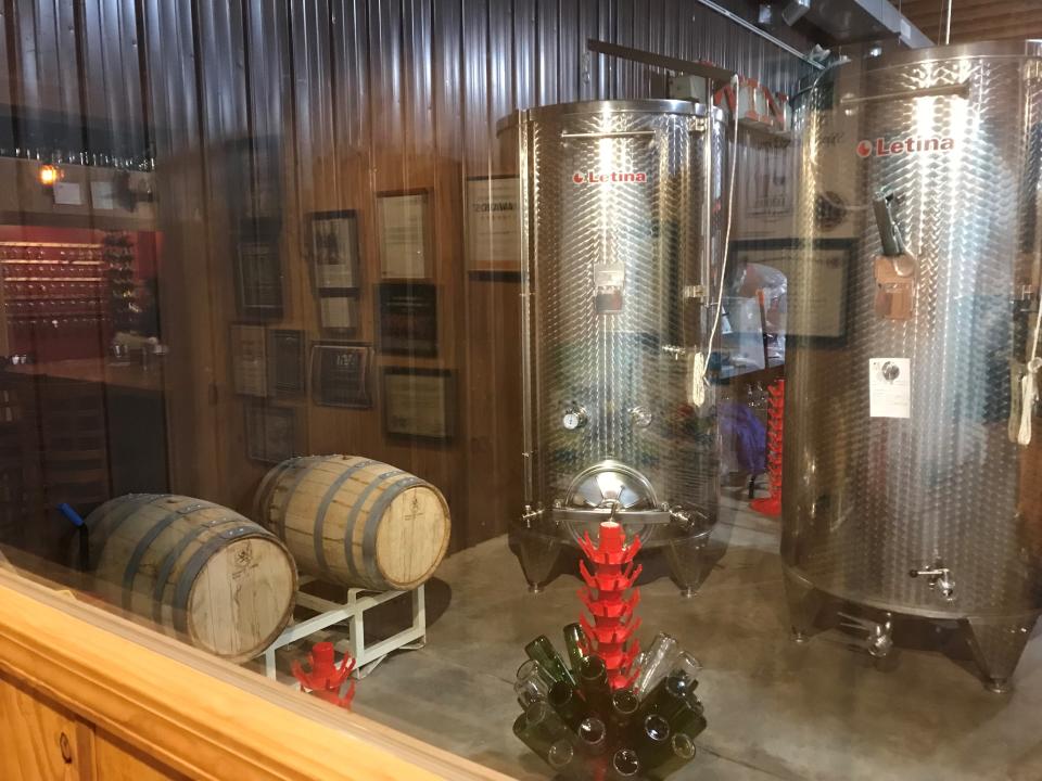 The Fenton Winery & Brewery has a public taproom, wine and beer garden, and a cedar building that is banquet facility seating up to 280 guests. One area offers a view into the craft operations.