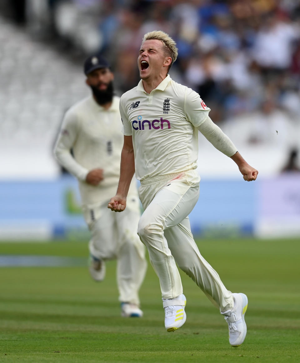 LONDON, ENGLAND - AUGUST 15: Sam Curran of England celebrates dismissing India captain Virat Kohli during day four of the Second LV= Insurance Test Match between England and India at Lord's Cricket Ground on August 15, 2021 in London, England. (Photo by Gareth Copley/Getty Images)