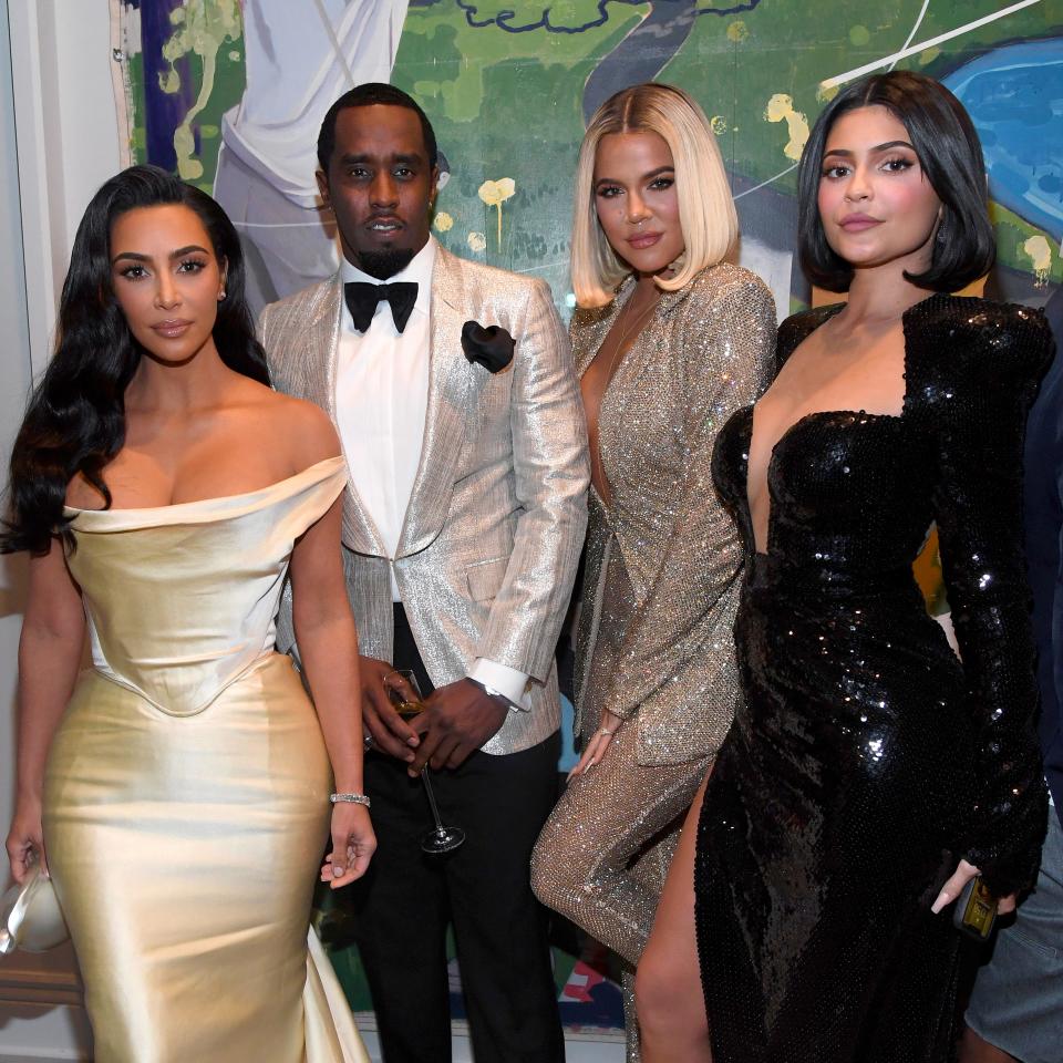 Kim Kardashian West, Diddy, Khloe Kardashian and Kyle Jenner pose for a group photo at the party.