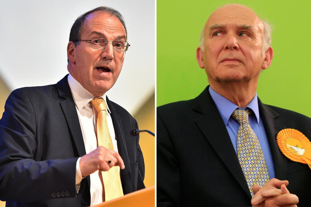 Under fire: Simon Hughes and Vince Cable