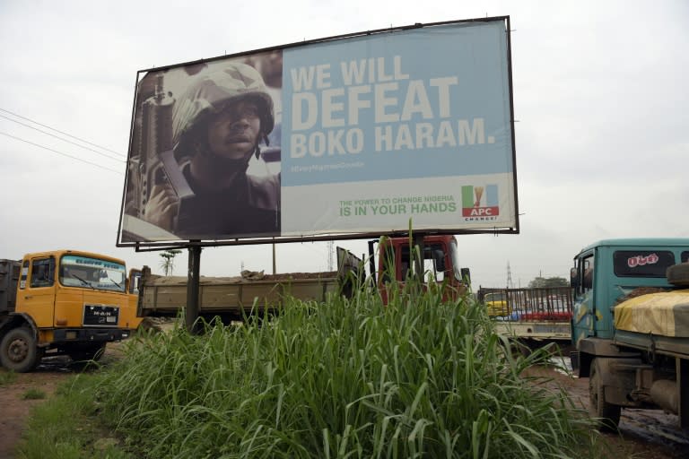 A campaign signboad displayed by the ruling All Progressives Congress stands in Ogijo, southwest Nigeria, on July 3, 2015