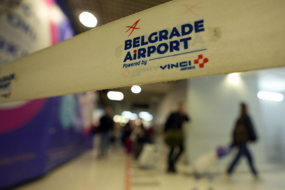 Passengers from the Moscow-Belgrade flight, operated by Air Serbia, pass through the airport building in Belgrade, Serbia, Wednesday, Sept. 21, 2022. Large numbers of Russians rushed to book one-way tickets out of the country while they still could Wednesday after Russian President Vladimir Putin announced a partial mobilization of military reservists for the war in Ukraine. (AP Photo/Darko Vojinovic)