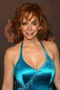<p>Reba might have been celebrated on this night in 2006 for her vast country music prowess, but we’re here to set the record straight: Her stunning blue silk dress deserved to be honored, too.</p>