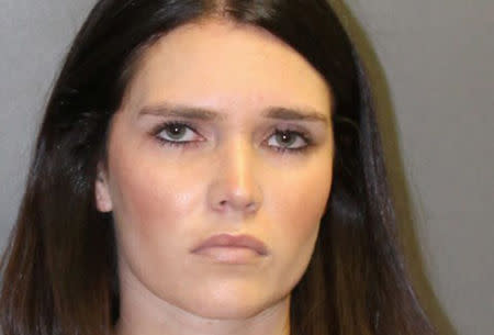 Cerissa Laura Riley, 31, appears in a booking photo provided by the Newport Beach Police Department September 19, 2018. Newport Beach Police Department/Handout via REUTERS