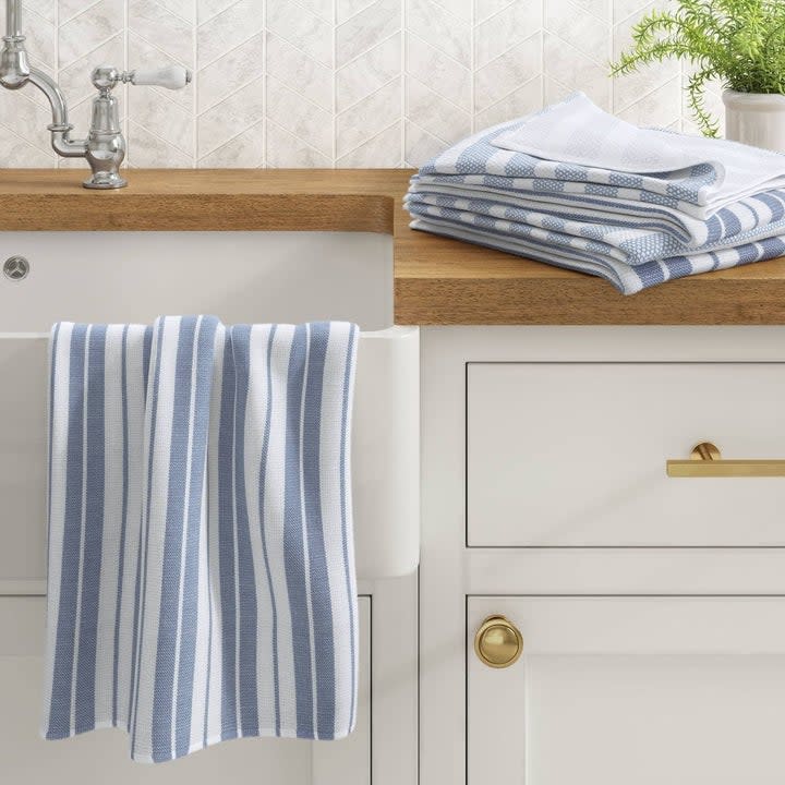 The kitchen towels pictured in blue and white stripes