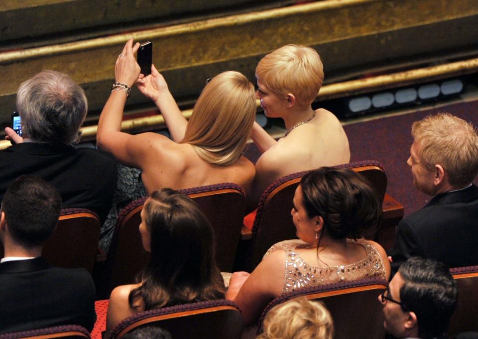 They also selfied. (Photo: Kevin Winter/Getty Images)