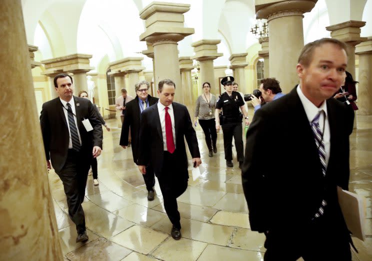 Office of Management and Budget Director Mick Mulvaney, right, White House chief of staff Reince Priebus, center, and White House chief strategist Steve Bannon, behind Priebus. (Photo: Alex Brandon/AP)