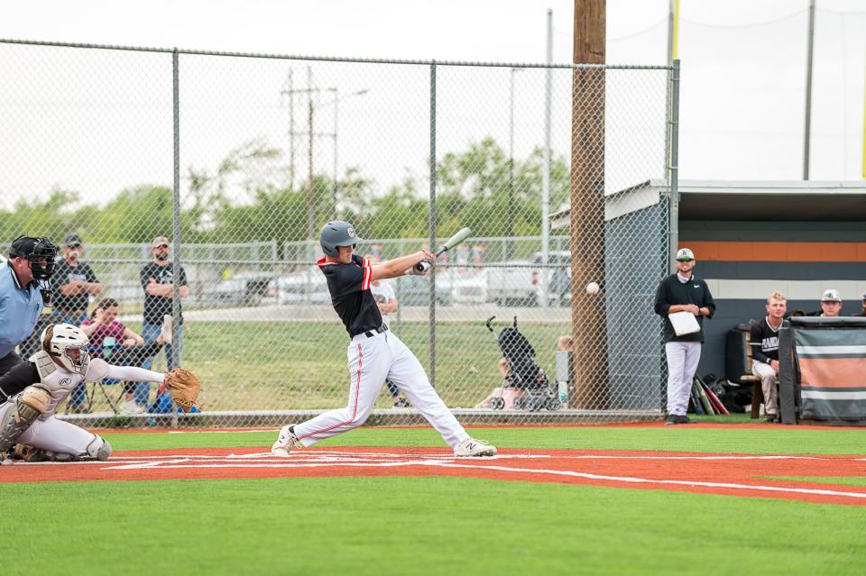 Caprock's Roger King hits a ball during a District 3-5A game Tuesday, April 27, 2021 against Randall at Caprock High School. [Shaie Williams for Amarillo Globe News]