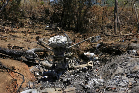 The wreckage of a military helicopter is pictured at the crash site near Villa Purificacion, Mexico, May 5, 2015. REUTERS/Stringer/File Photo