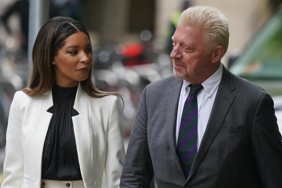 Becker arrives alongside girlfriend Lilian de Carvalho Monteiro at Southwark crown court earlier this year for his tax evasion case (PA Wire)