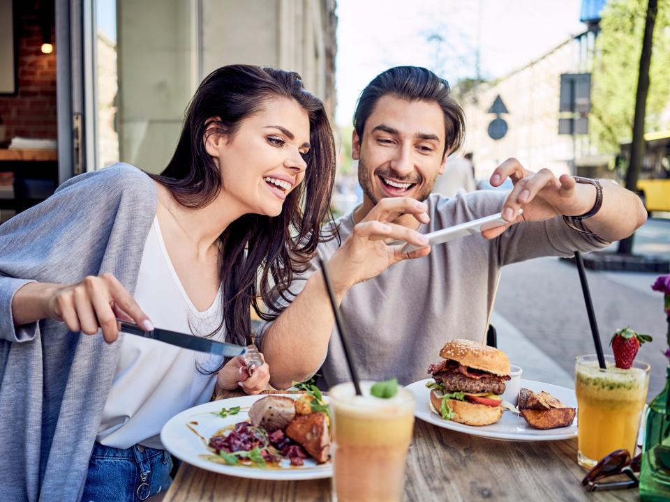 couple laughing at restaurant