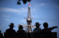 The Mayflower II, a replica of the original Mayflower ship that brought the Pilgrims to America 400 year ago, is docked in Plymouth, Mass., days after returning home following extensive renovations, Wednesday, Aug. 12, 2020. A disease outbreak that wiped out large numbers of the Native inhabitants of what is now New England gave the Pilgrims a beachhead in the "New World." So, some historians find it ironic that a pandemic has put many of the 400th anniversary commemorations of the Mayflower's landing on hold. (AP Photo/David Goldman)