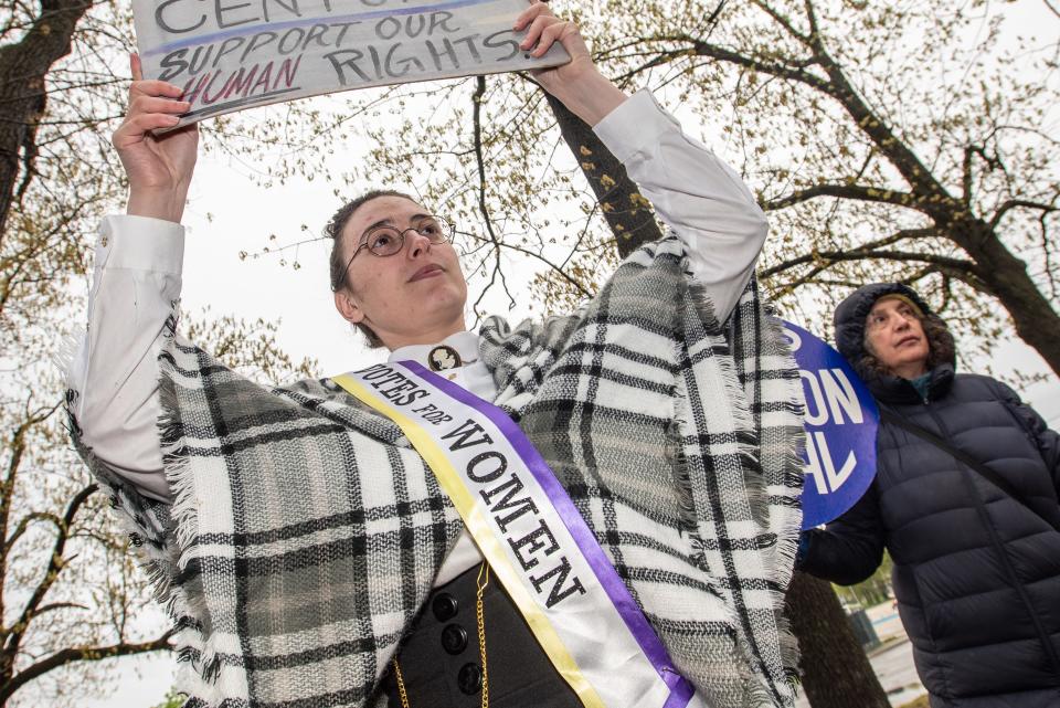 An abortion rights rally is held at Memorial Park in Fair Lawn on Saturday May 7, 2022. Francesca Costa from Closter, NJ holds up a sign during the rally. 