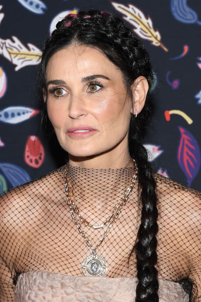 <p>Give off princess vibes with a braided crown and Rapunzel length hair like actress Demi Moore. </p>