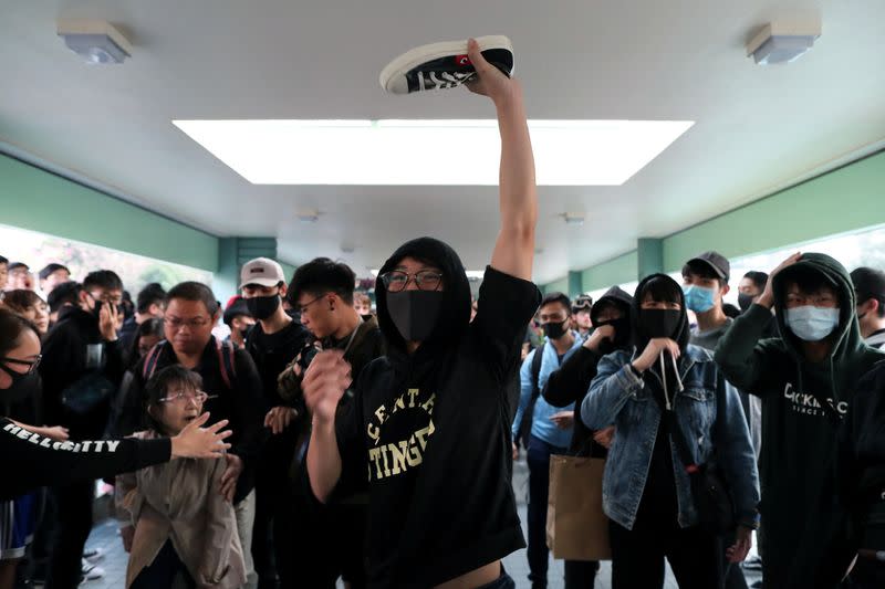 Anti-government demonstrators protest in Sheung Shui shopping mall in Hong Kong