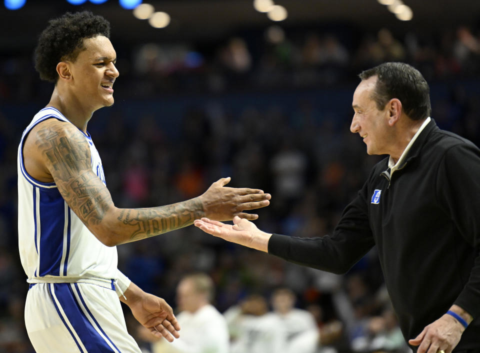 Paolo Banchero and Duke coach Mike Krzyzewski will try to get the Blue Devils into the Elite Eight. (Photo by Eakin Howard/Getty Images)