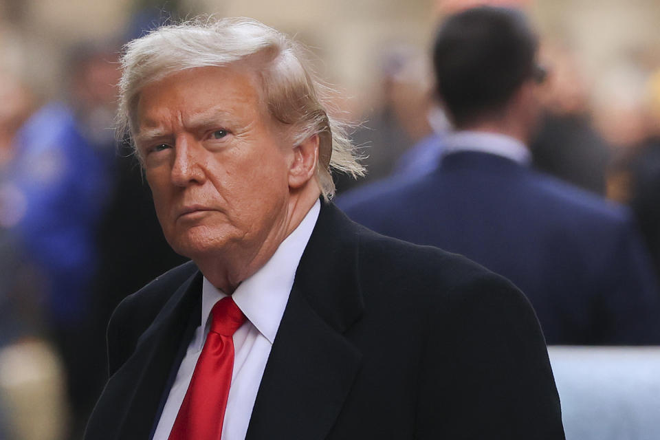 Former President Donald Trump arrives for a press conference at 40 Wall Street after a pre-trial hearing at Manhattan criminal court, Monday, March 25, 2024, in New York. A New York judge has scheduled an April 15 trial date in former President Donald Trump's hush money case. Judge Juan M. Merchan made the ruling Monday. (AP Photo/Yuki Iwamura)