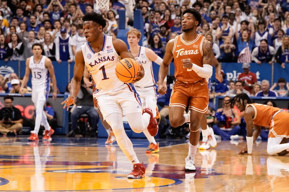 Kansas junior guard Joseph Yesufu (1) drives down the court after a change of possession in the first half of Monday's game against Texas inside Allen Fieldhouse.