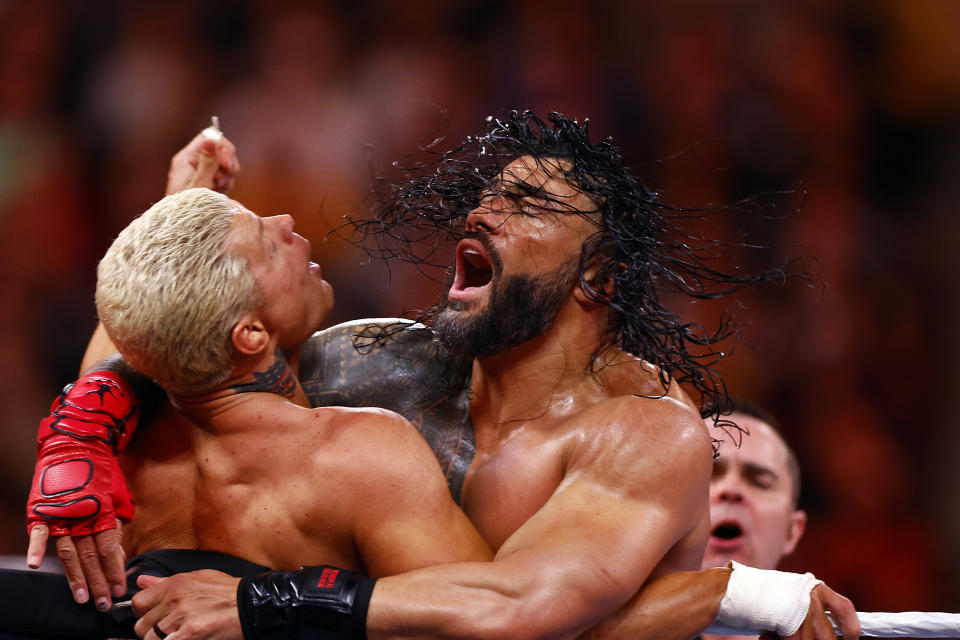 INGLEWOOD, CALIFORNIA - APRIL 02:  (L-R) Cody Rhodes wrestles Roman Reigns for Undisputed WWE Universal Title Match during WrestleMania Goes Hollywood at SoFi Stadium on April 02, 2023 in Inglewood, California.
 (Photo by Ronald Martinez/Getty Images)