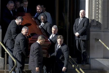 Actor Phillip Seymour Hoffman's casket is carried out following the funeral in the Manhattan borough of New York, February 7, 2014. REUTERS/Brendan McDermid