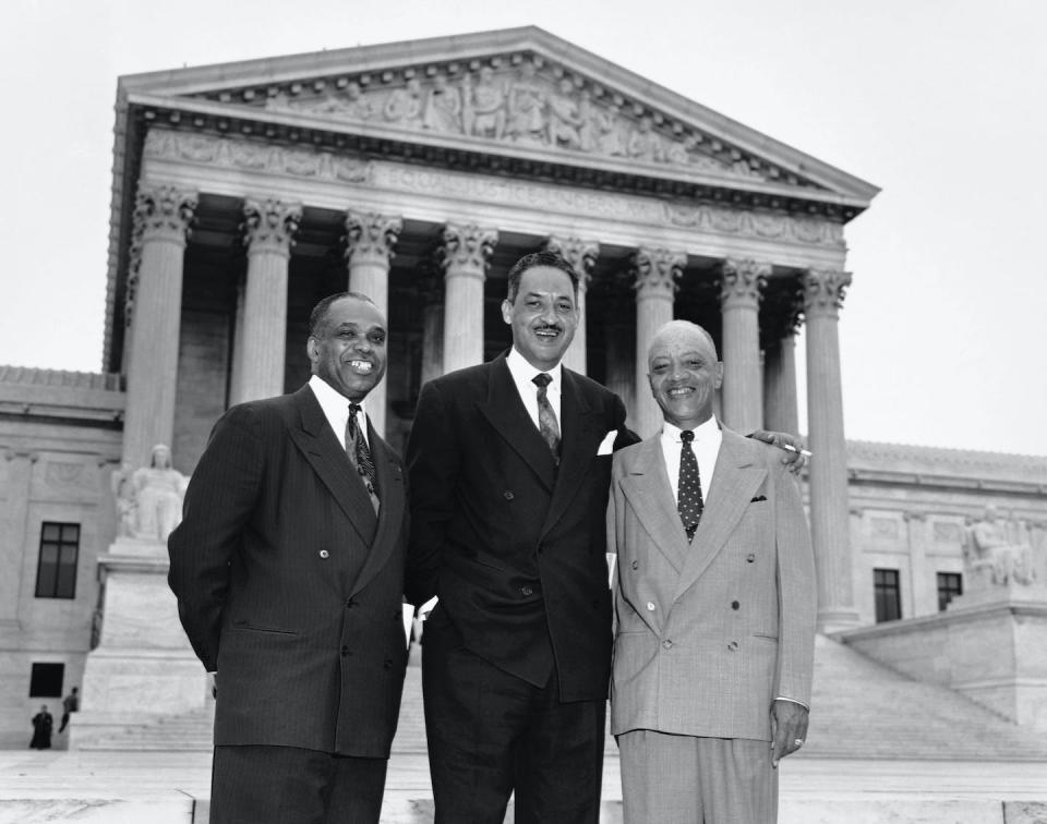 The three attorneys who won Brown v. Board of Education stand outside the Supreme Court after their victory: from left, George E.C. Hayes, Thurgood Marshall and James Nabrit Jr. <a href="https://www.gettyimages.com/detail/news-photo/washington-dc-attorneys-who-argued-the-case-against-news-photo/517387902" rel="nofollow noopener" target="_blank" data-ylk="slk:Bettmann via Getty Images;elm:context_link;itc:0;sec:content-canvas" class="link ">Bettmann via Getty Images</a>
