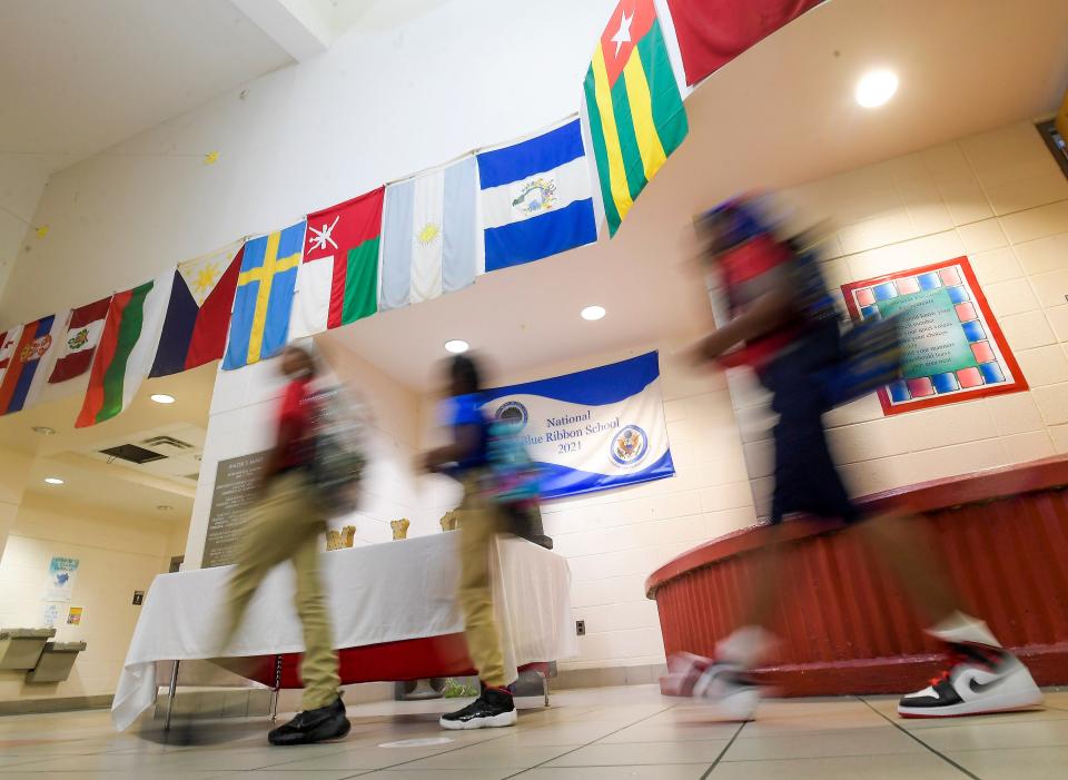 Students arrive at MacMillan International Academy on the first day of school in Montgomery, Ala., on Thursday August 10, 2023.