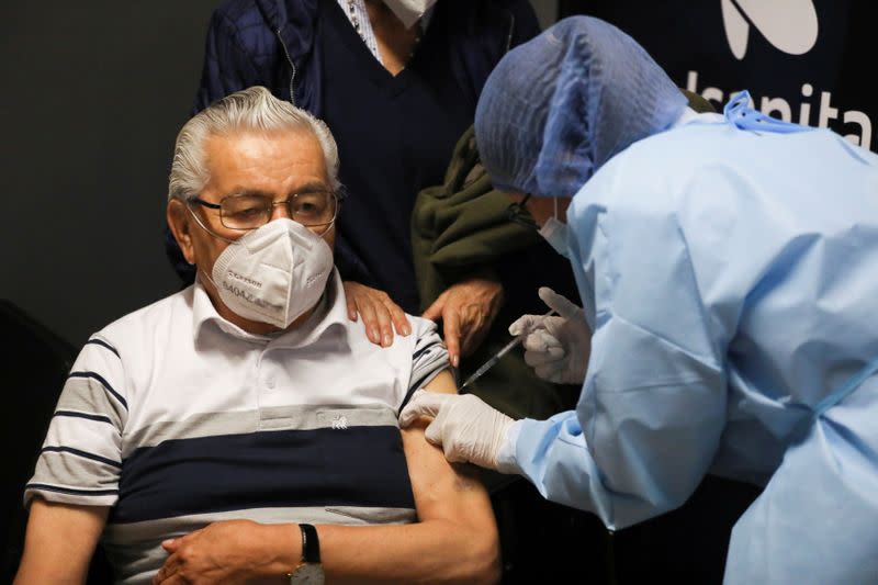 FILE PHOTO: Mass vaccination program for the elderly people, in Bogota