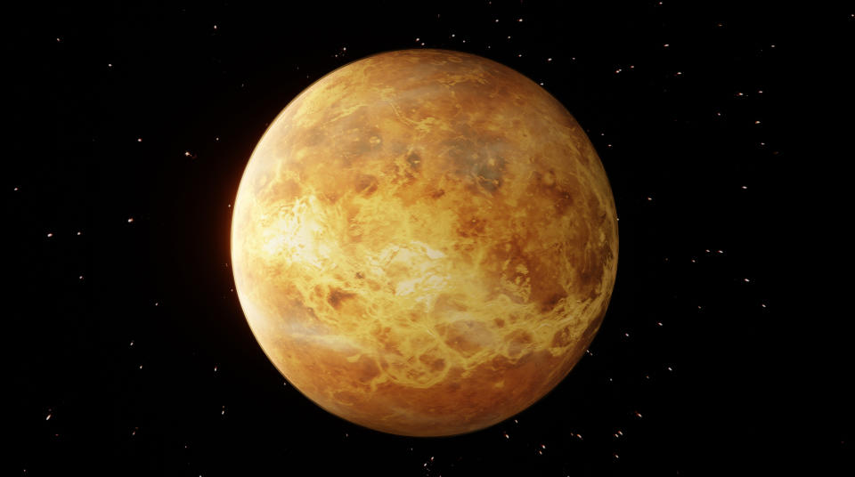 a yellow-orange planet with visible clouds