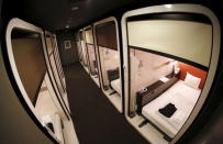 "Business-class" cabins are seen at First Cabin hotel, which was converted from an old office building, in Tokyo, July 3, 2015. REUTERS/Toru Hanai