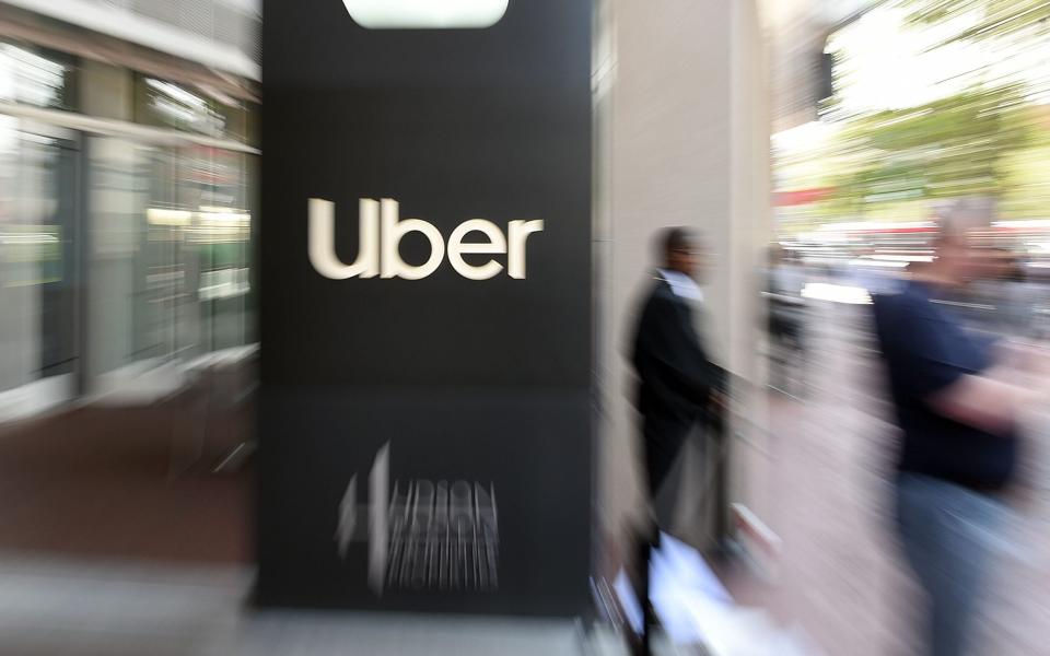 Uber is set to allow employees to stay home until next Summer - Josh Edelson/AFP