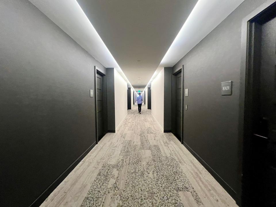 Looking down the hotel room floor.