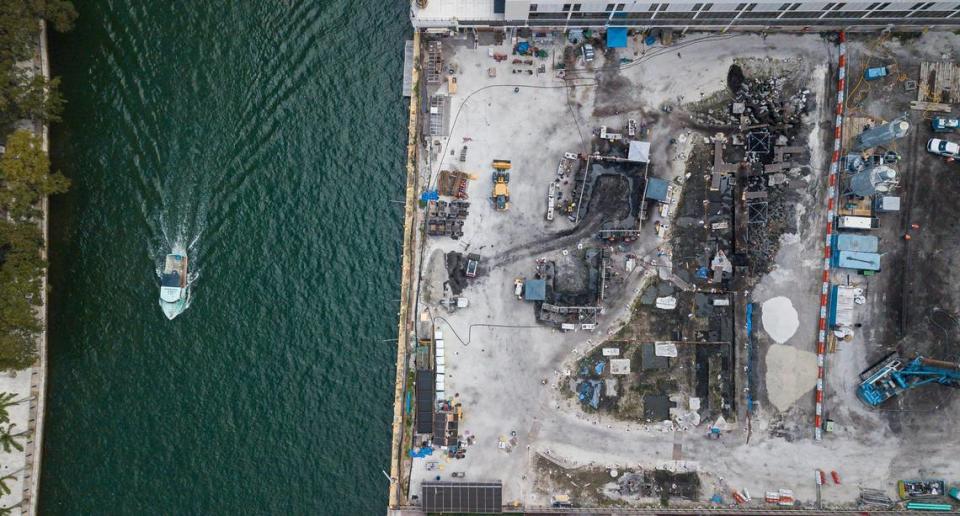 Aerial view shows people working an archaeological dig site located near Brickell on the River on Monday, Jan. 30, 2023, in Miami. Artifacts going back 7,000 years have been found at the site, along with postholes, gravesites, human remains and other evidence of substantial settlement by the Tequesta Native American tribe.