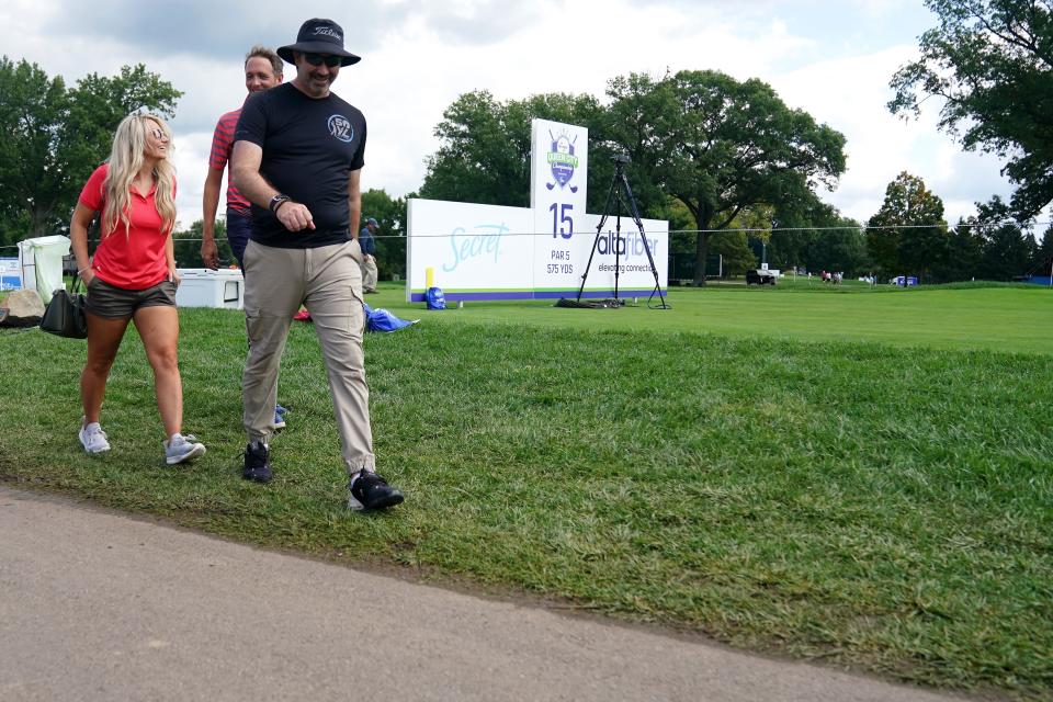 Spectators walk between holes Nos.1 and 15, Wednesday, Sept. 7, 2022, during a pro-am portion of the Kroger Queen City Championship golf tournament at Kenwood Country Club in Madeira, Ohio. 